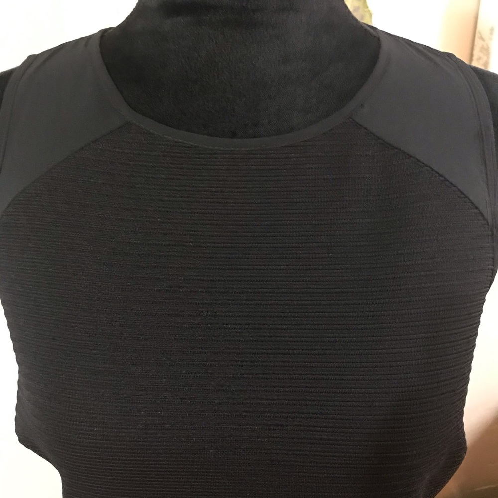 The limited sleeveless dress  gold zipper in back